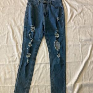 DISTRESSED SKINNY JEANS